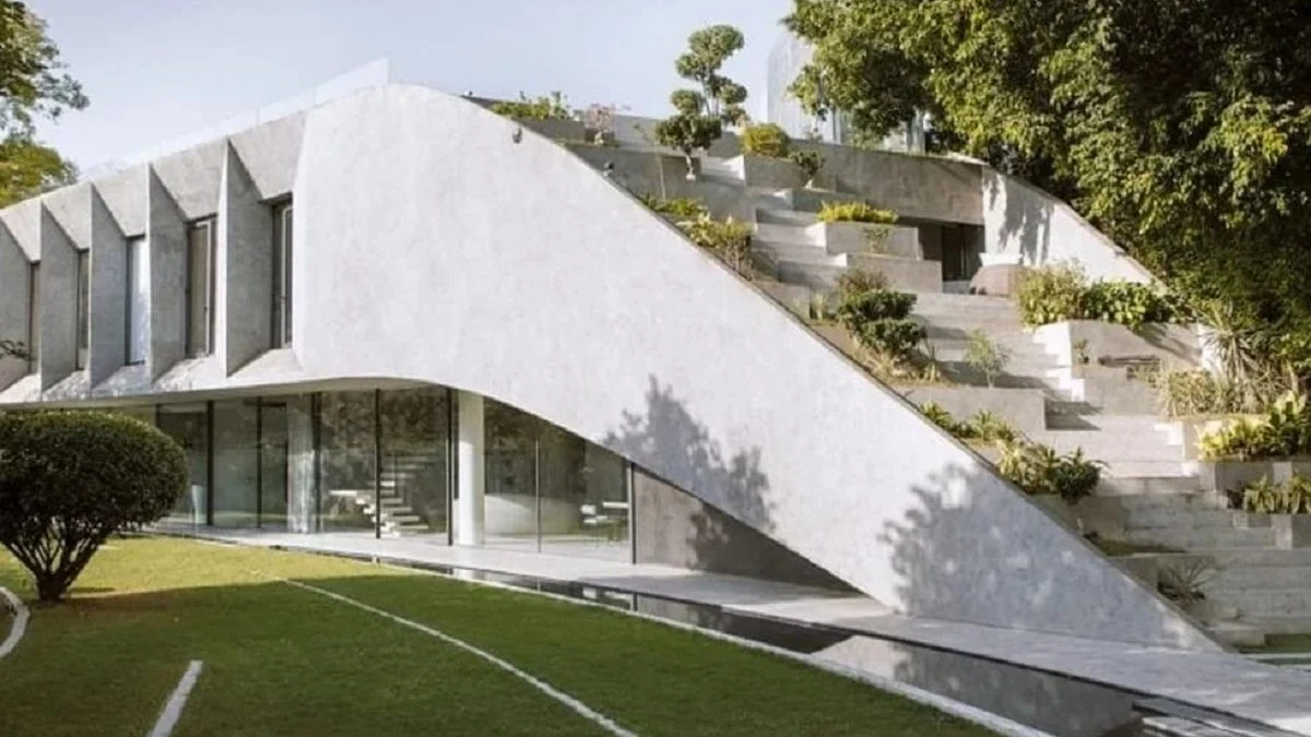 Villa KD45 Emerges From The Landscape With Its Plant-Covered Roof